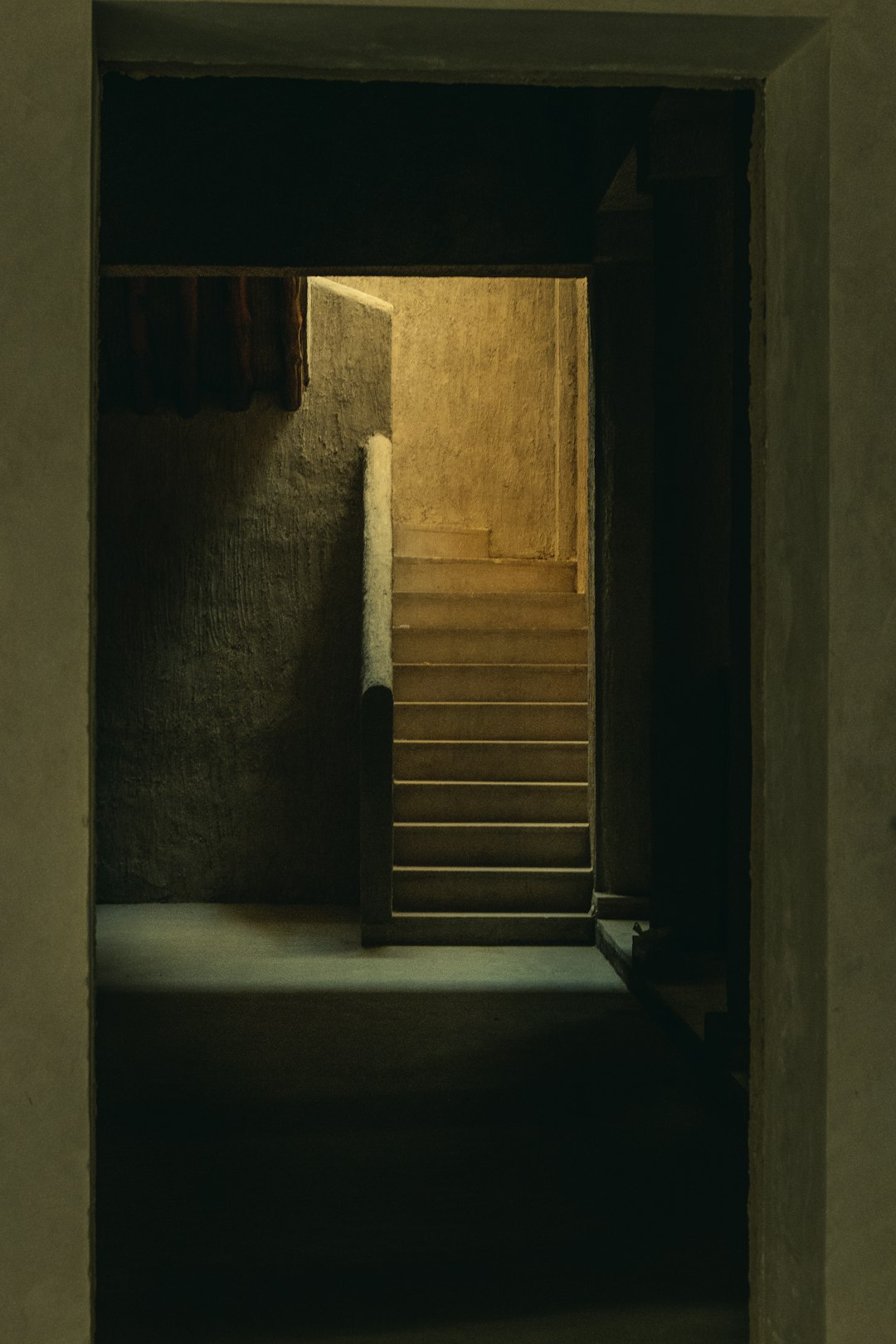 brown-wooden-door-on-gray-concrete-wall-i4fq2sbqrre
